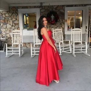 Im selling this because I wore it once to a ball!